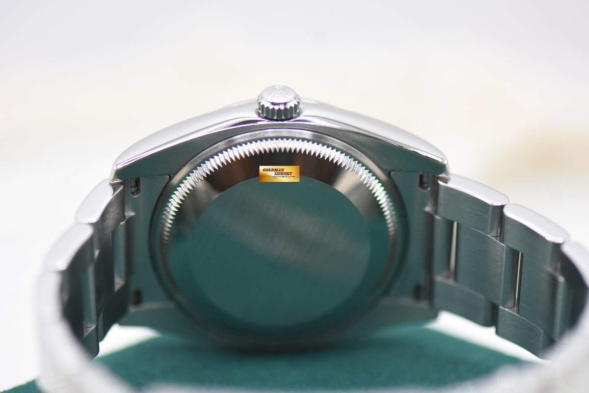 ROLEX OYSTER DATE 34mm STEEL OYSTER BRACELET BLACK ROMAN DIAL 115200 (MINT)