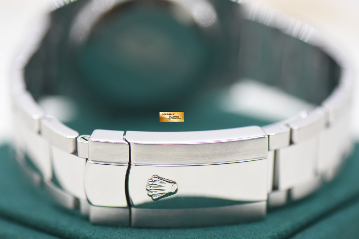 ROLEX OYSTER DATE 34mm STEEL OYSTER BRACELET BLACK ROMAN DIAL 115200 (MINT)