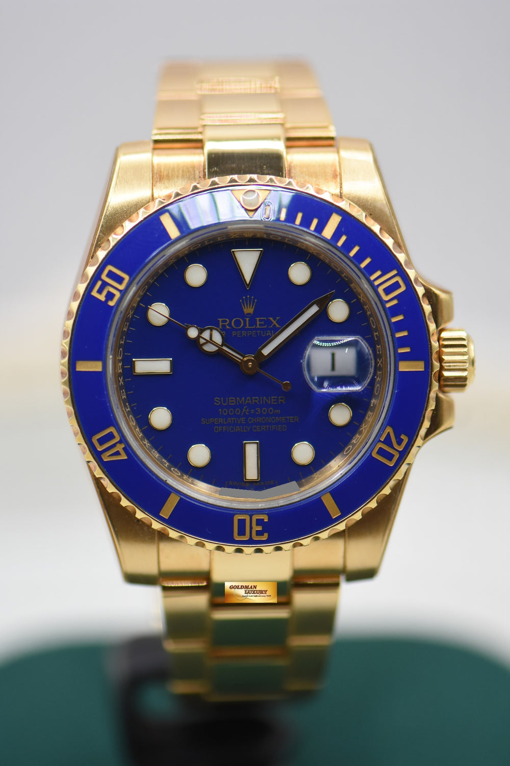 ROLEX OYSTER SUBMARINER BLUE CERAMIC BEZEL MATTE BLUE DIAL GOLD IN BRACELET 116618LB (MINT)