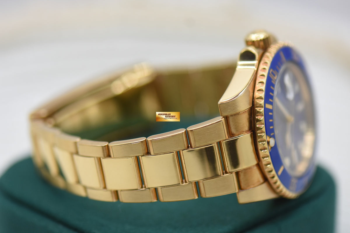 ROLEX OYSTER SUBMARINER BLUE CERAMIC BEZEL MATTE BLUE DIAL GOLD IN BRACELET 116618LB (MINT)