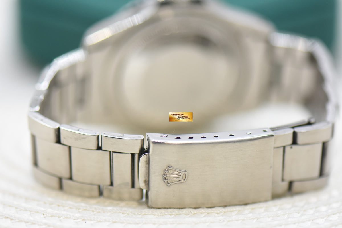 ROLEX OYSTER GMT-MASTER 40mm STEEL BRACELET PEPSI BEZEL 16750 (TRANSITIONAL-MODEL) (MINT)