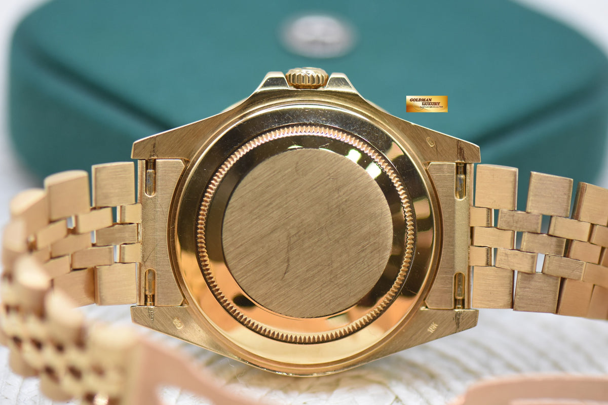 ROLEX OYSTER GMT-MASTER II YELLOW GOLD IN JUBILEE BRACELET BLACK DIAL 16718 (MINT)