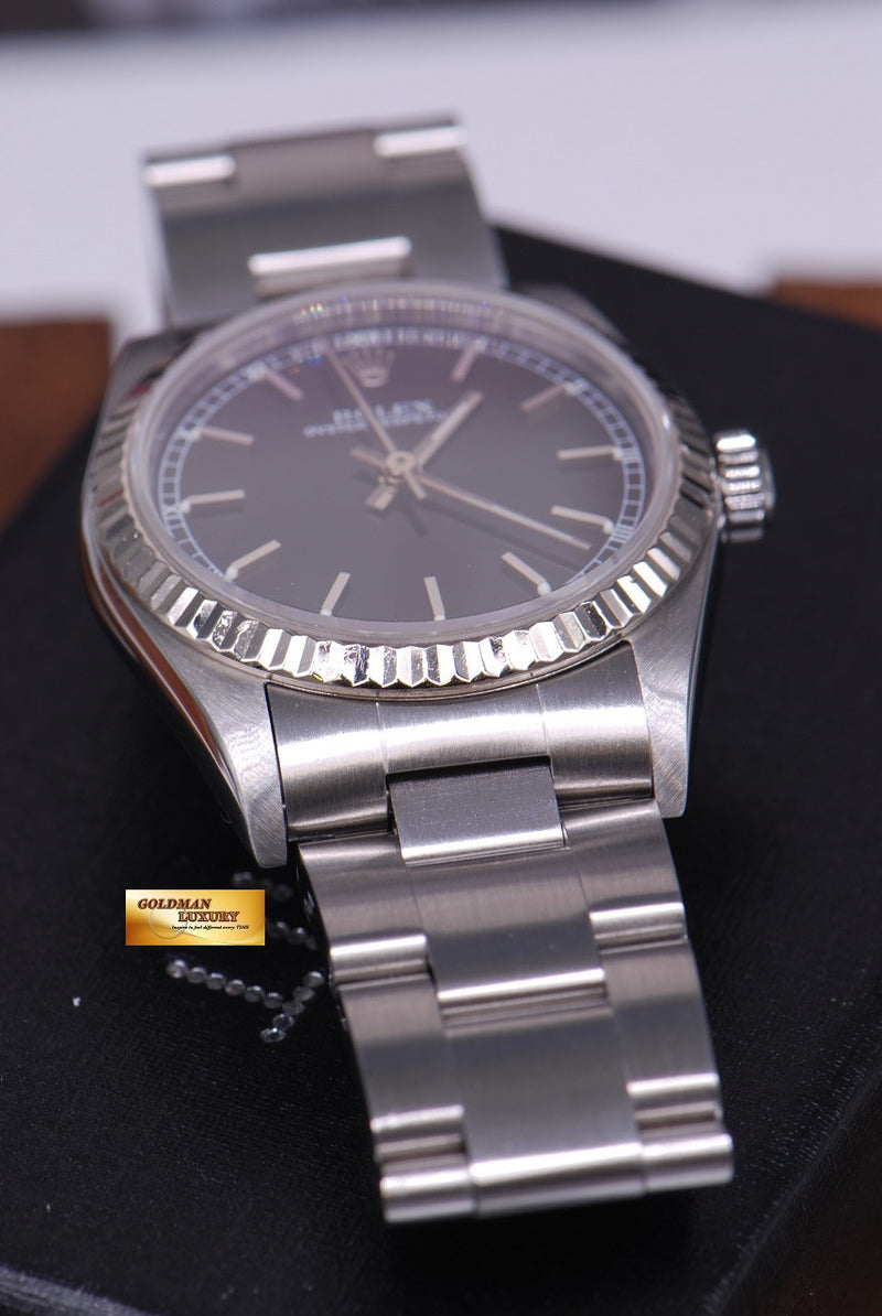 products/GML1039_-_Rolex_Oyster_Perpetual_30mm_Stainless_Ref_77014_MINT_-_3.JPG