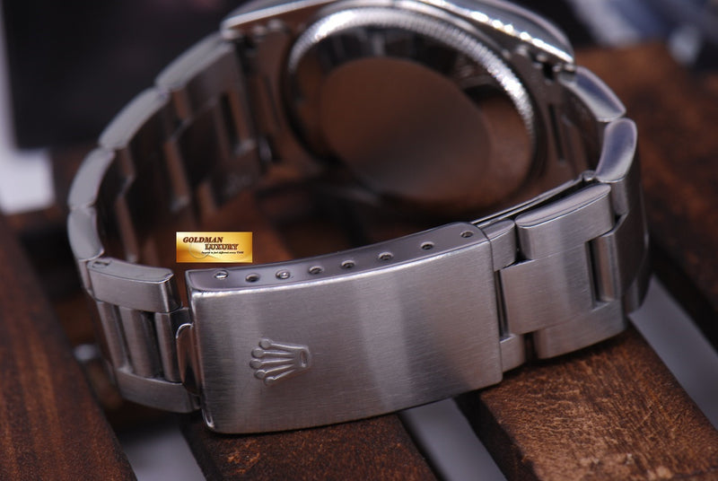 products/GML1039_-_Rolex_Oyster_Perpetual_30mm_Stainless_Ref_77014_MINT_-_9.JPG