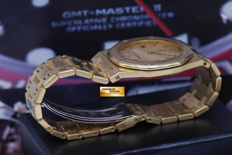 products/GML1089_-_Audemars_Piguet_Royal_Oak_18K_Yellow_Gold_35mm_Quartz_NEAR_MINT_-_14.JPG