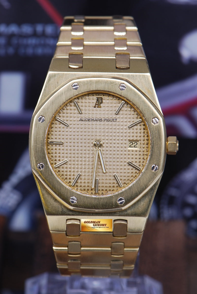products/GML1089_-_Audemars_Piguet_Royal_Oak_18K_Yellow_Gold_35mm_Quartz_NEAR_MINT_-_1.JPG