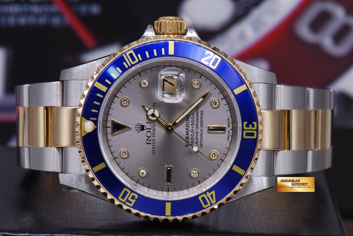 [SOLD] ROLEX OYSTER PERPETUAL BLUE SUBMARINER HALF-GOLD SERTI DIAMONDS Ref : 16613 (MINT)