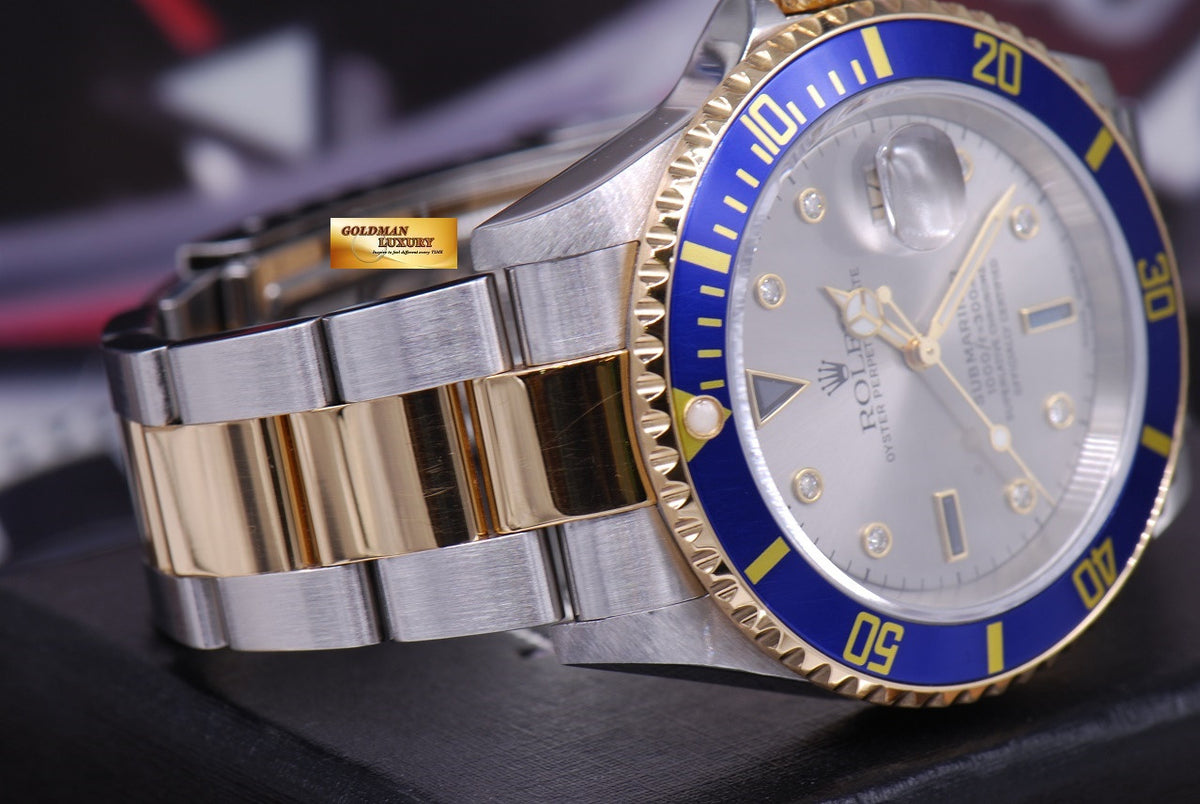 [SOLD] ROLEX OYSTER PERPETUAL BLUE SUBMARINER HALF-GOLD SERTI DIAMONDS Ref : 16613 (MINT)