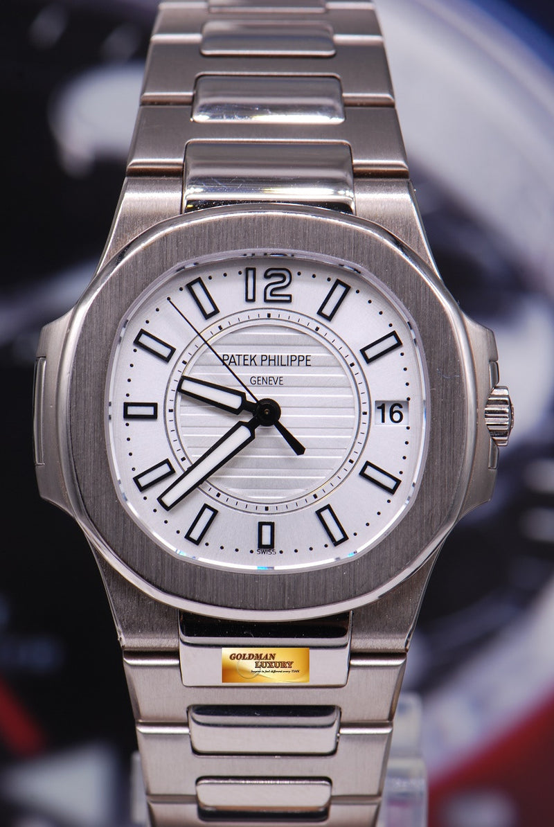 SOLD PATEK PHILIPPE NAUTILUS 18K WHITE GOLD LADIES QUARTZ 7011 1G Goldman Luxury