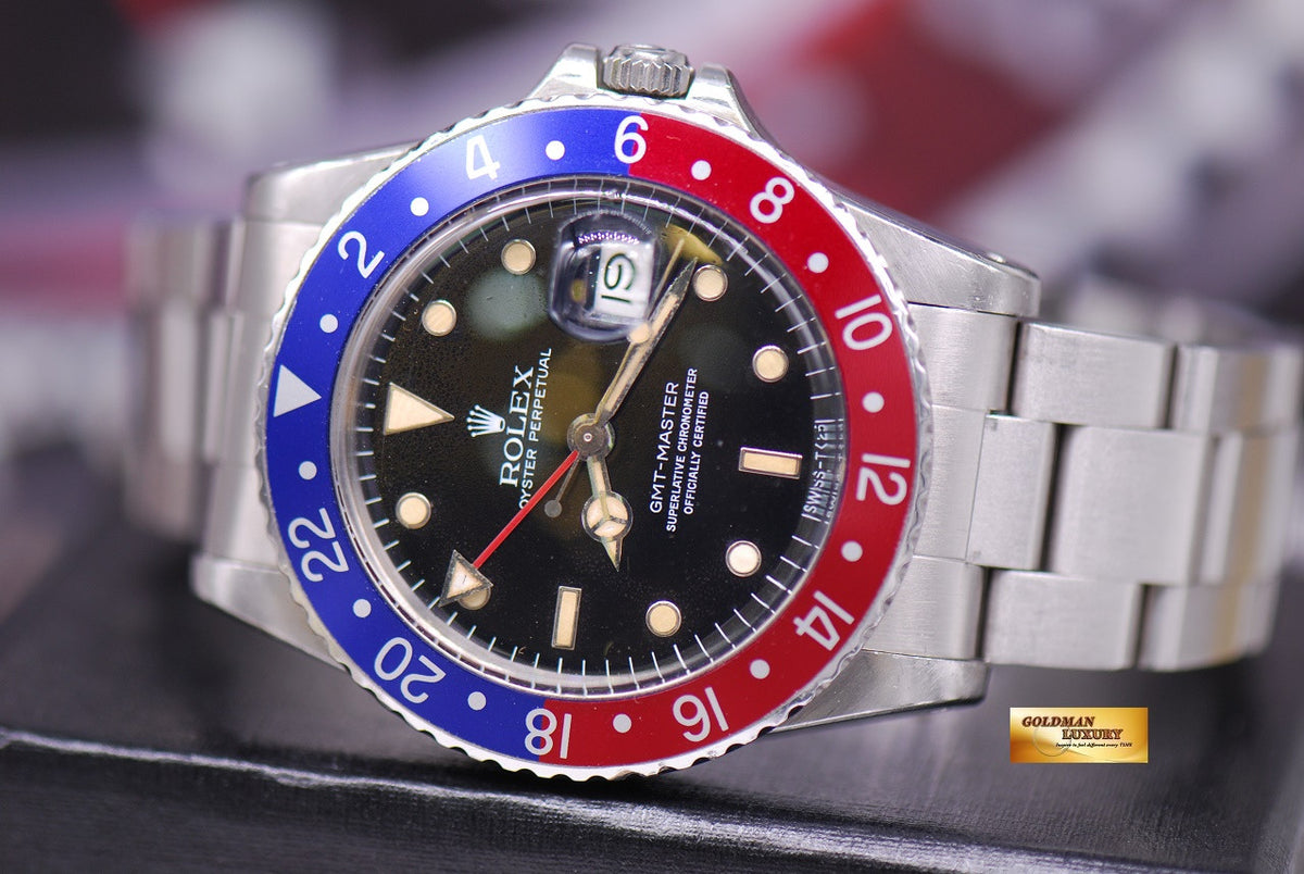 [SOLD] ROLEX OYSTER PERPETUAL GMT-MASTER PEPSI BEZEL TRANSITION MODEL 16750 (AGING)
