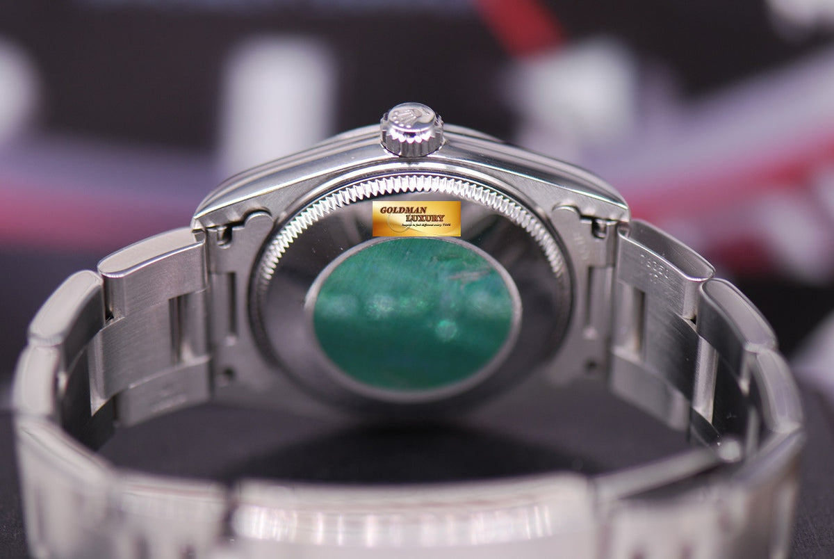 [SOLD] ROLEX OYSTER PERPETUAL 31mm BOYSIZE SALMON DIAL STAINLESS STEEL 77080 (MINT)