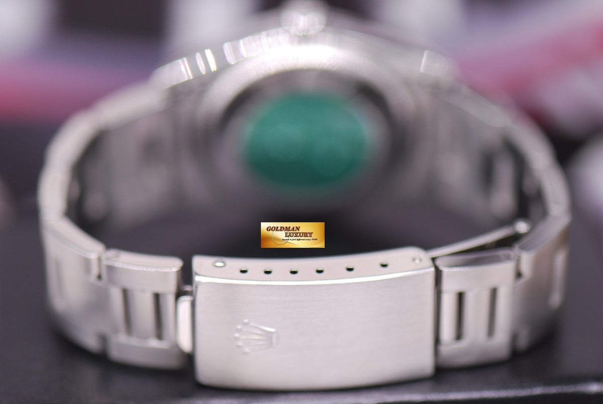 [SOLD] ROLEX OYSTER PERPETUAL 31mm BOYSIZE SALMON DIAL STAINLESS STEEL 77080 (MINT)