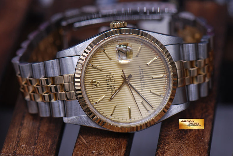 products/GML1385_-_Rolex_Oyster_Datejust_Half-Gold_Tapesty_Dial_16233_-_10.JPG