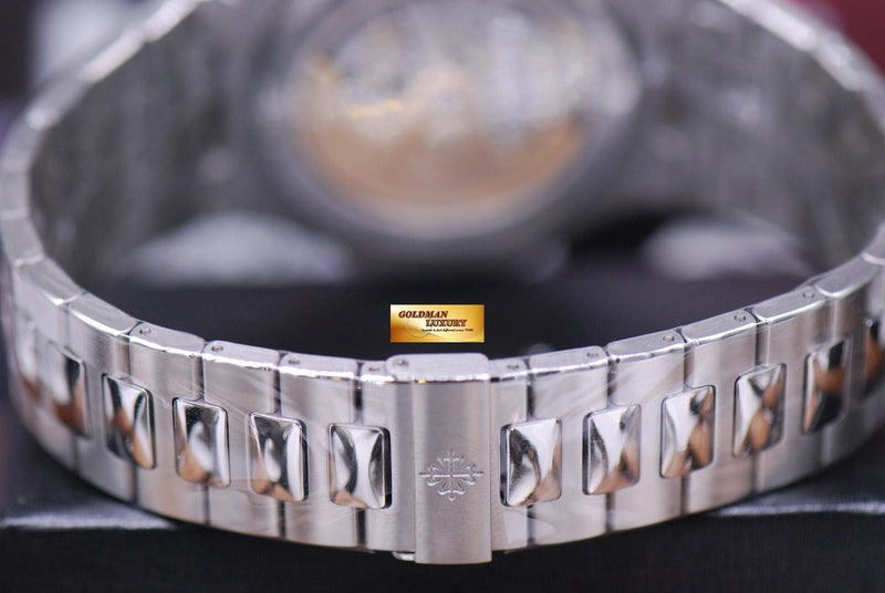 products/GML1416_-_Patek_Philippe_Nautilus_Men_s_Stainless_Steel_White_5711_NEW_-_9.JPG