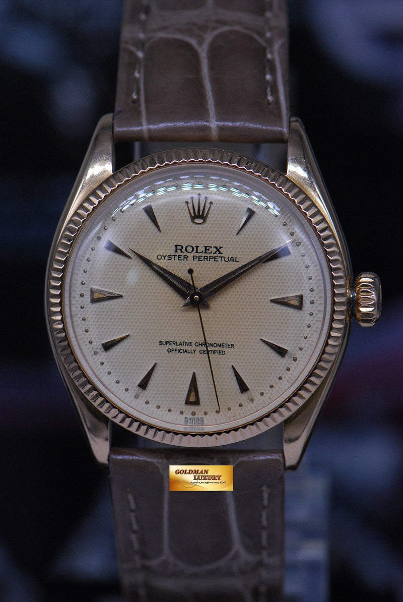 products/GML1459_-_Rolex_Oyster_Perpetual_Semi-Bubble_18K_Rose_Gold_Honeycomb_6285_-_1.JPG