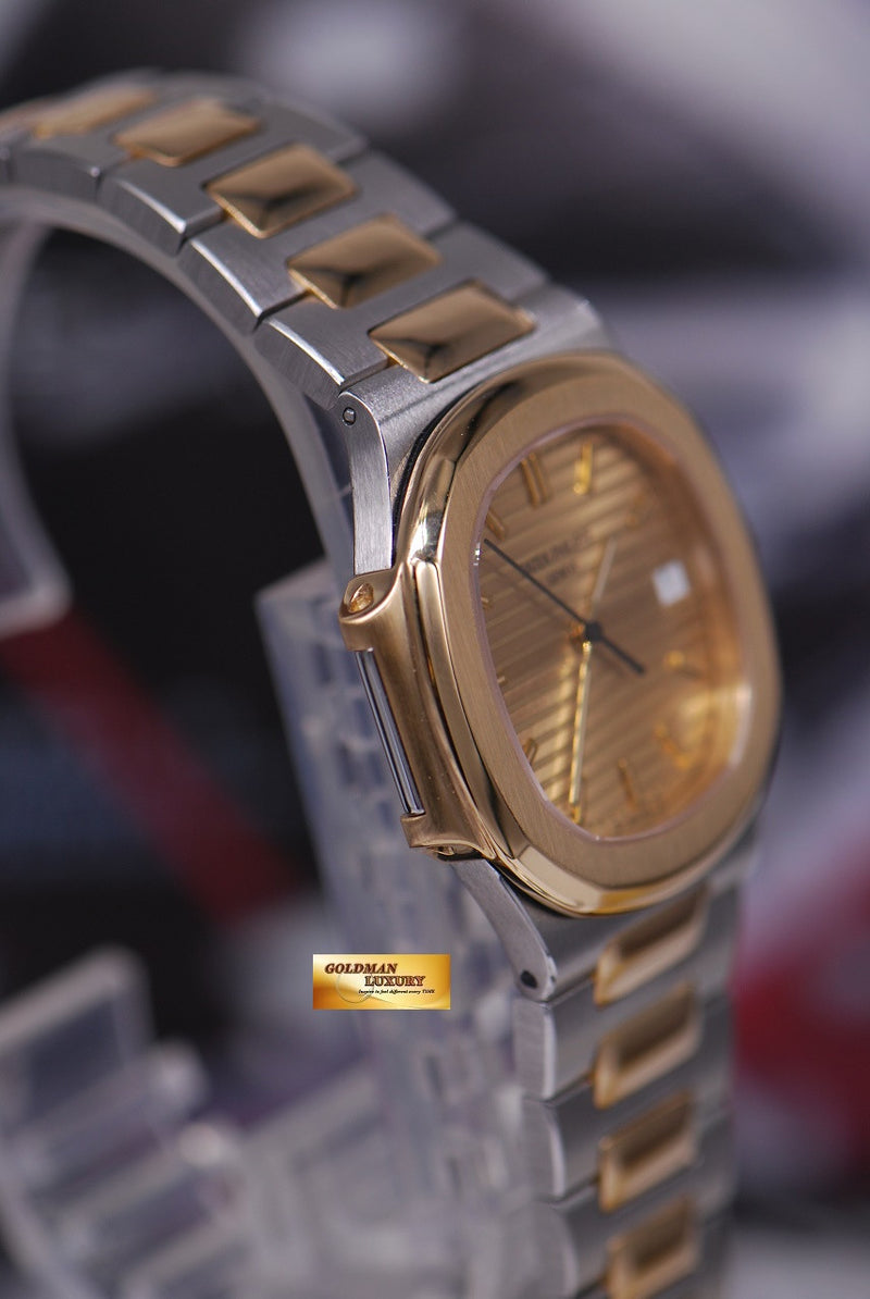 products/GML1462_-_Patek_Philippe_Nautilus_Ladies_Midsize_Half-Gold_Quartz_3900_-_4.JPG