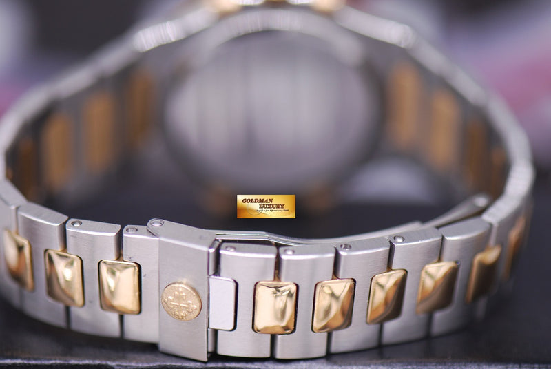products/GML1462_-_Patek_Philippe_Nautilus_Ladies_Midsize_Half-Gold_Quartz_3900_-_9.JPG