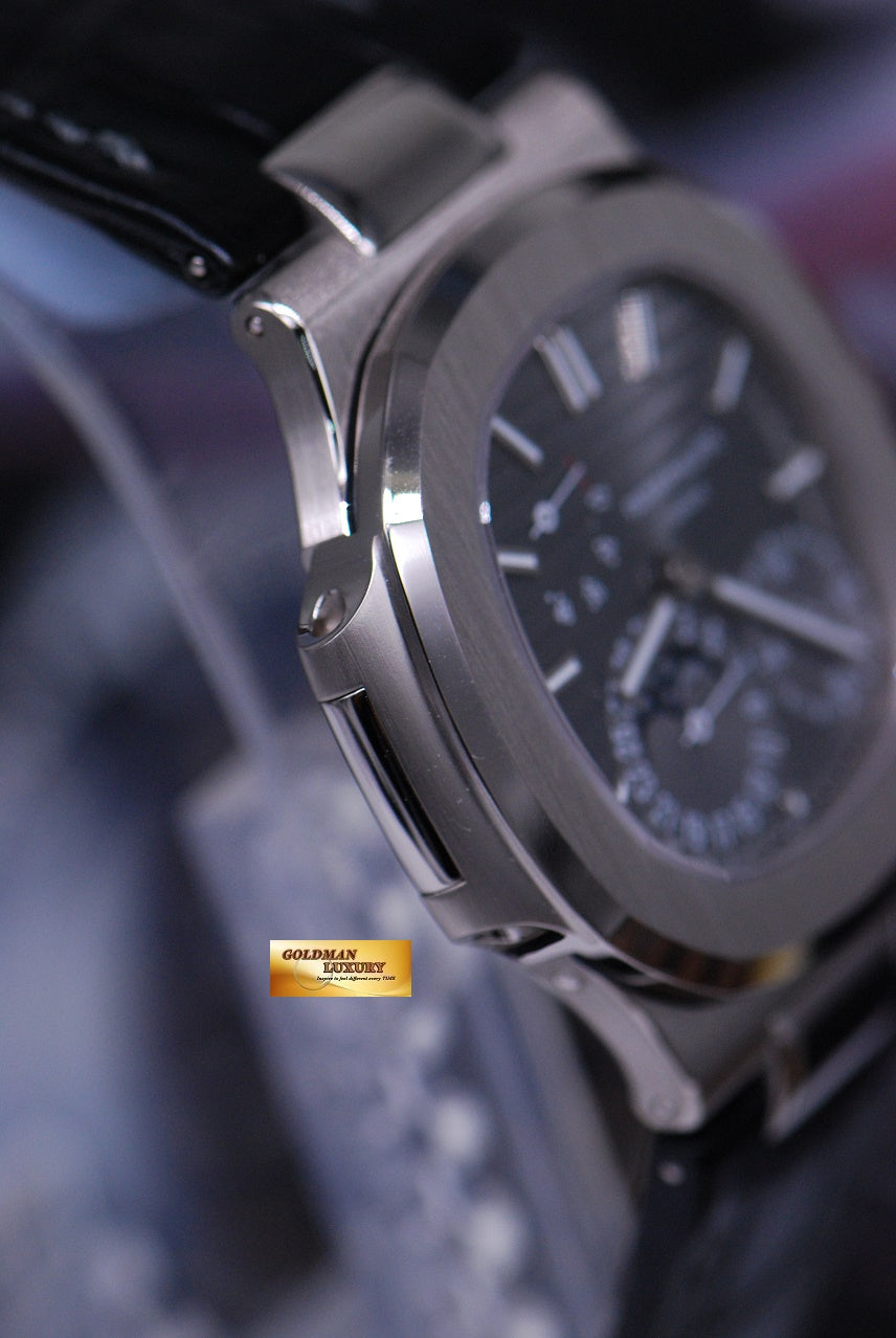 [SOLD] PATEK PHILIPPE NAUTILUS 18K WHITE GOLD MOONPHASE POWER RESERVE 5712G-001 (NEW-UNWORN)