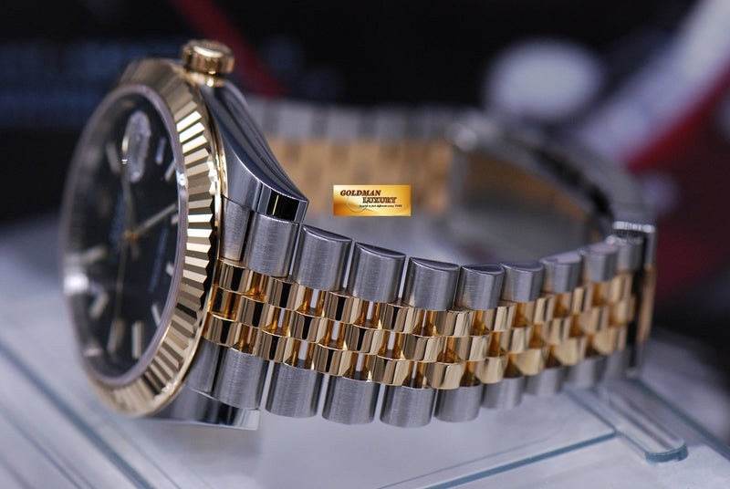 Rolex datejust 41 hotsell two tone black dial