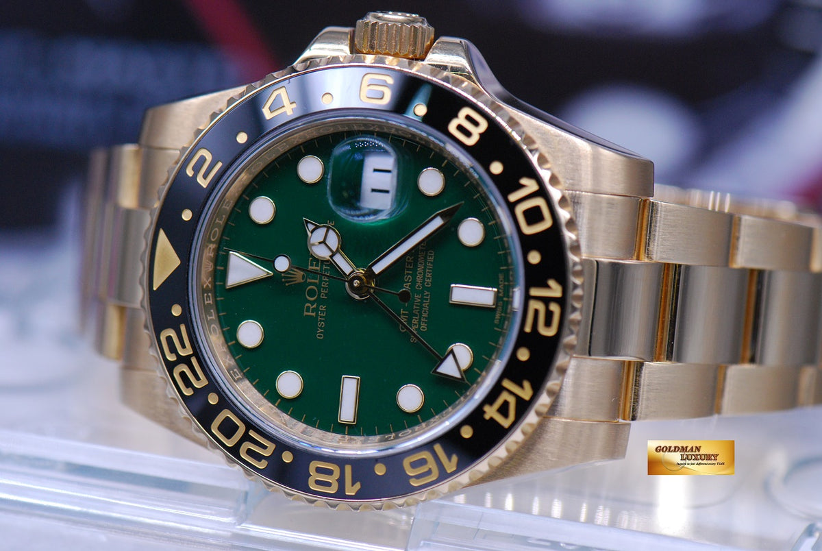 [SOLD] ROLEX OYSTER PERPETUAL GMT-MASTER II 18K YELLOW GOLD GREEN DIAL CERAMIC BLACK 116718 (MINT)