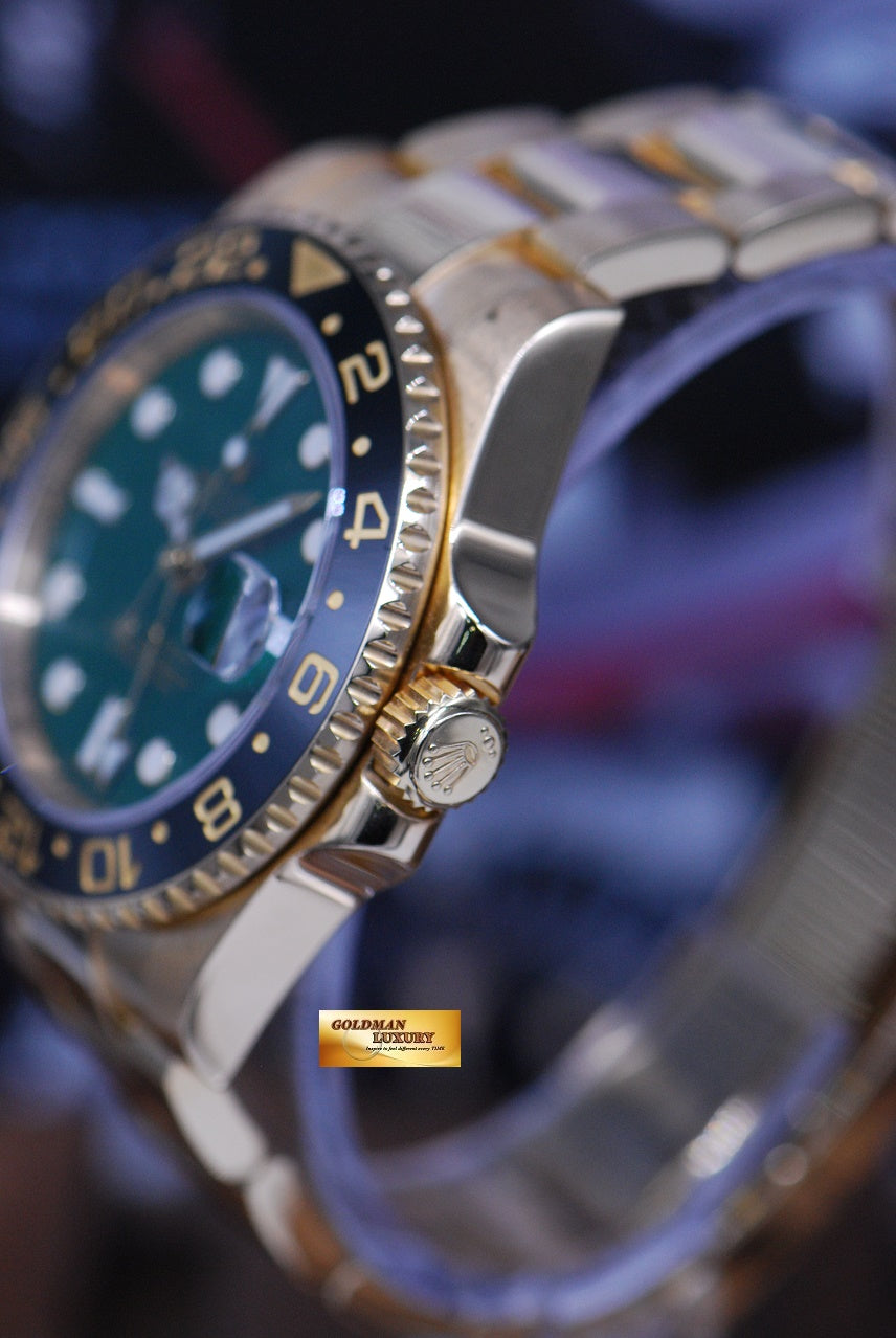 [SOLD] ROLEX OYSTER PERPETUAL GMT-MASTER II 18K YELLOW GOLD GREEN DIAL CERAMIC BLACK 116718 (MINT)