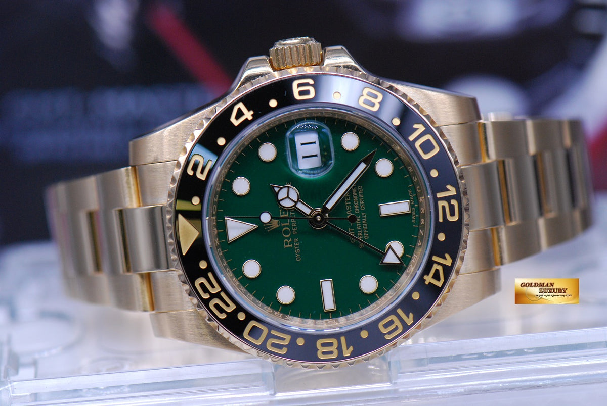 [SOLD] ROLEX OYSTER PERPETUAL GMT-MASTER II 18K YELLOW GOLD GREEN DIAL CERAMIC BLACK 116718 (MINT)