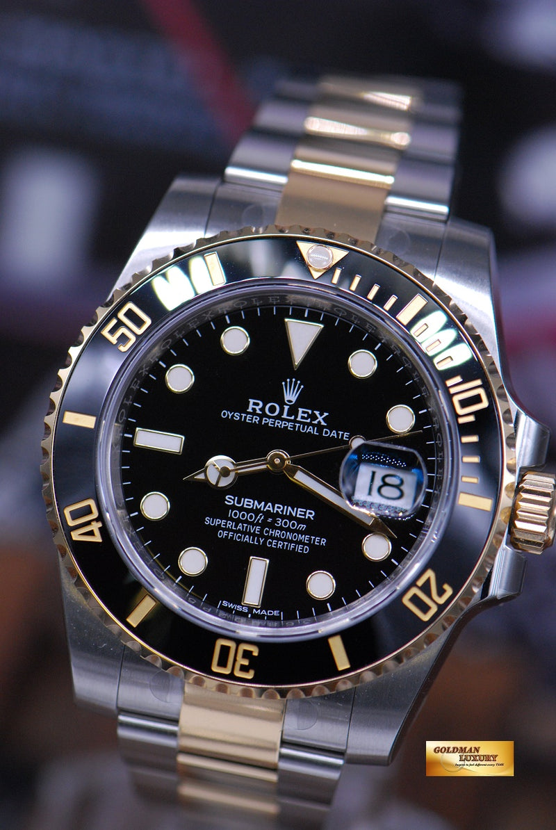 SOLD ROLEX OYSTER PERPETUAL SUBMARINER HALF GOLD CERAMIC BEZEL