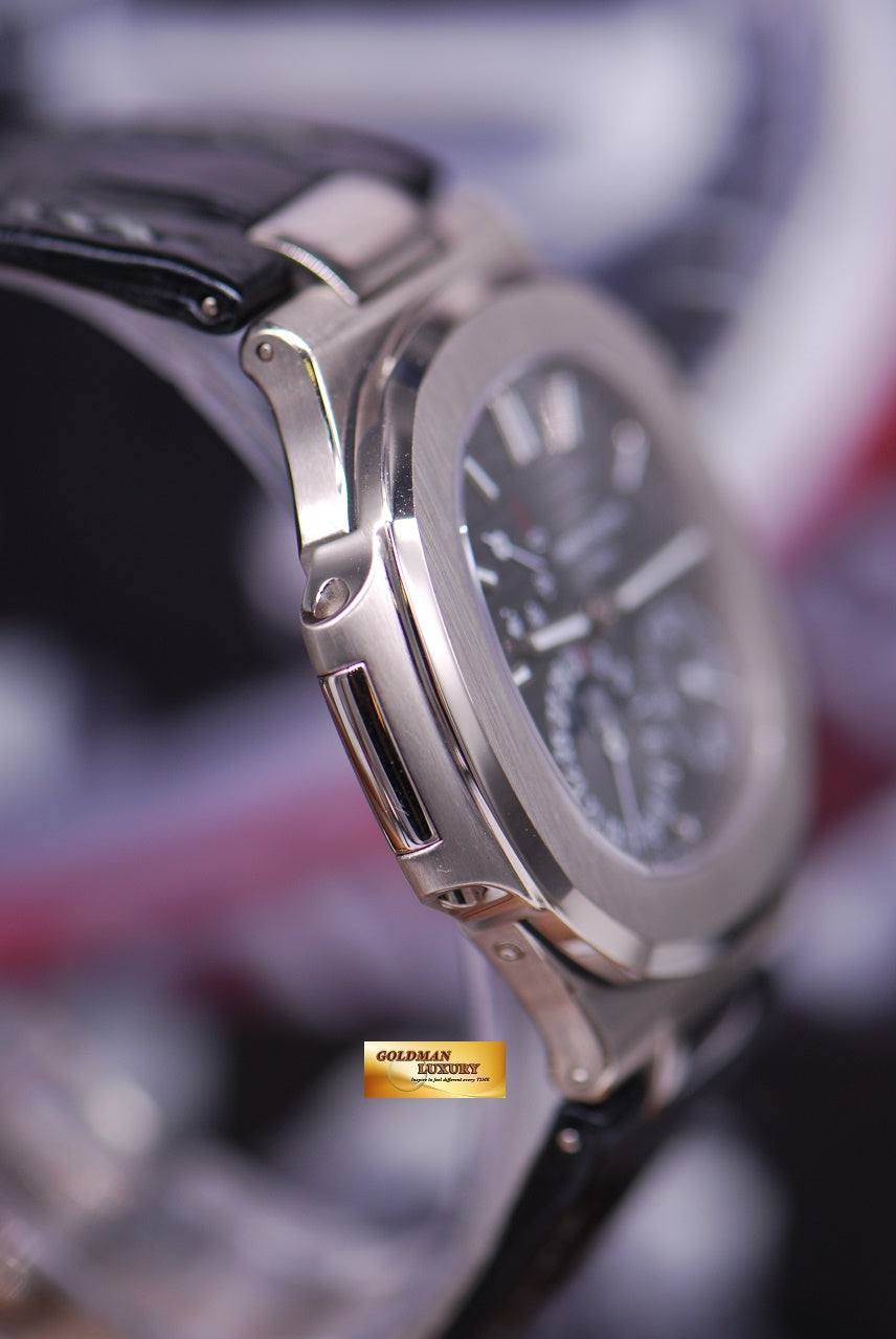 [SOLD] PATEK PHILIPPE NAUTILUS 18K WHITE GOLD MOONPHASE POWER RESERVE 5712G-001 (LNIB)