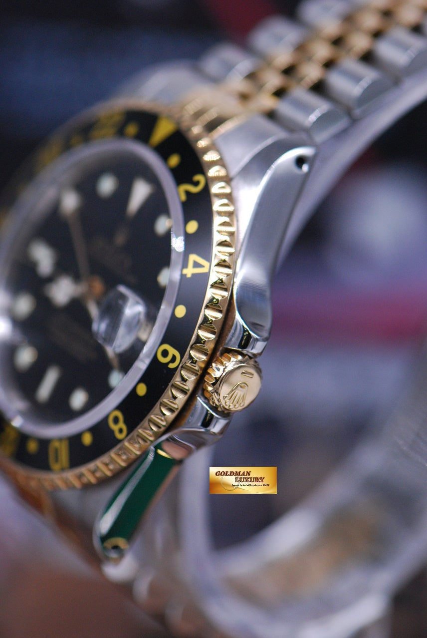 [SOLD] ROLEX OYSTER PERPETUAL GMT-MASTER II HALF-GOLD BLACK 16713 (MINT)