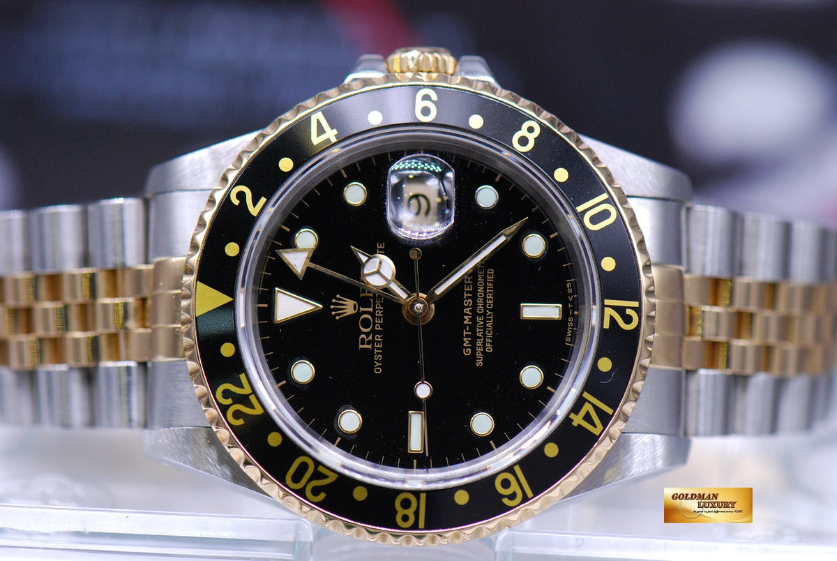[SOLD] ROLEX OYSTER PERPETUAL GMT-MASTER II HALF-GOLD BLACK 16713 (MINT)