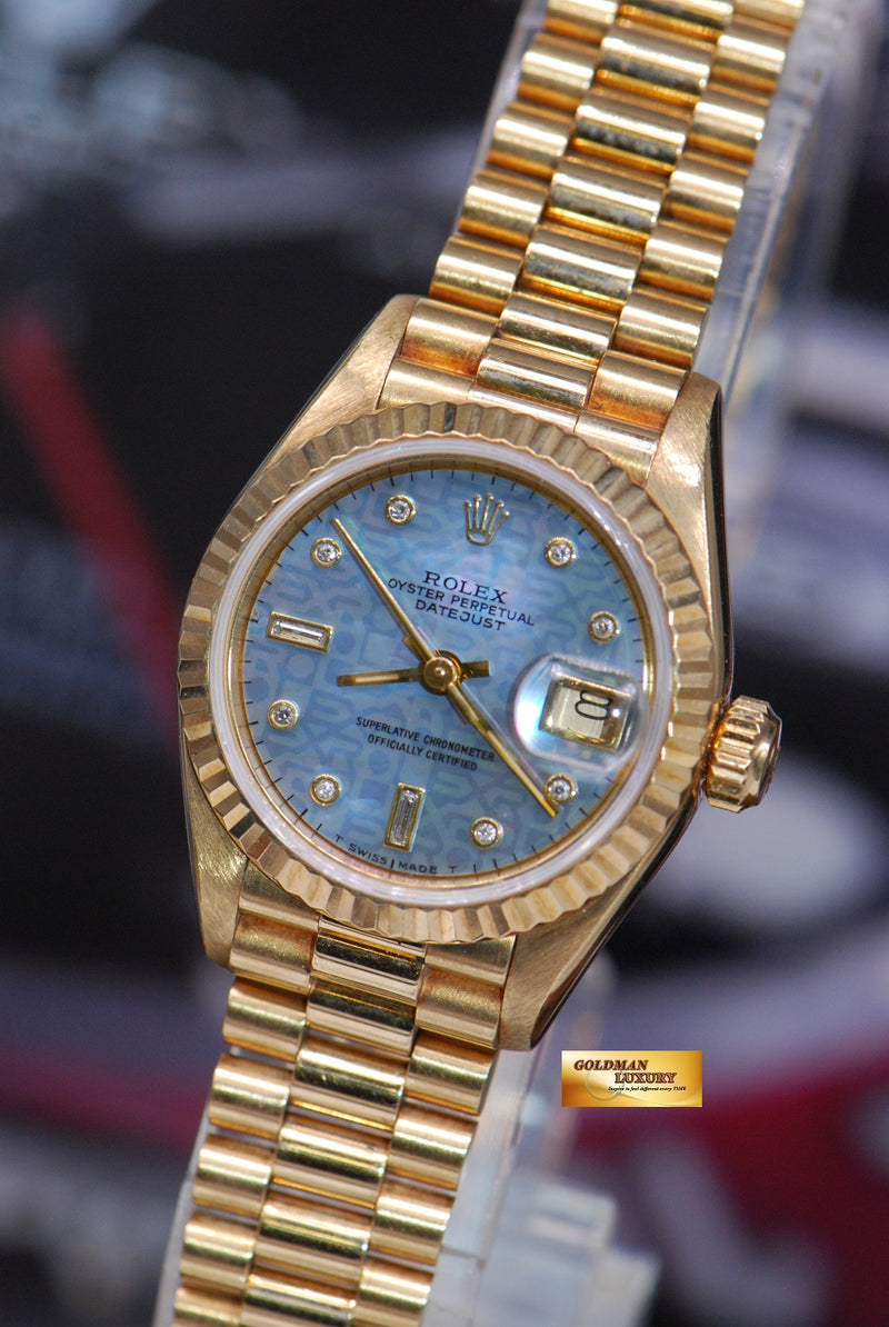 products/GML1766_-_Rolex_Oyster_Datejust_Ladies_26mm_18K_Yellow_Gold_MOP_Blue_69178_-_2.JPG