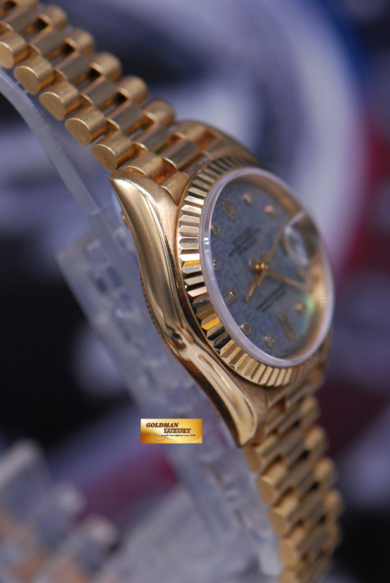 products/GML1766_-_Rolex_Oyster_Datejust_Ladies_26mm_18K_Yellow_Gold_MOP_Blue_69178_-_4.JPG