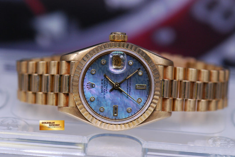 products/GML1766_-_Rolex_Oyster_Datejust_Ladies_26mm_18K_Yellow_Gold_MOP_Blue_69178_-_5.JPG