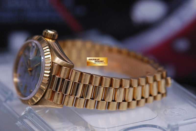 products/GML1766_-_Rolex_Oyster_Datejust_Ladies_26mm_18K_Yellow_Gold_MOP_Blue_69178_-_7.JPG