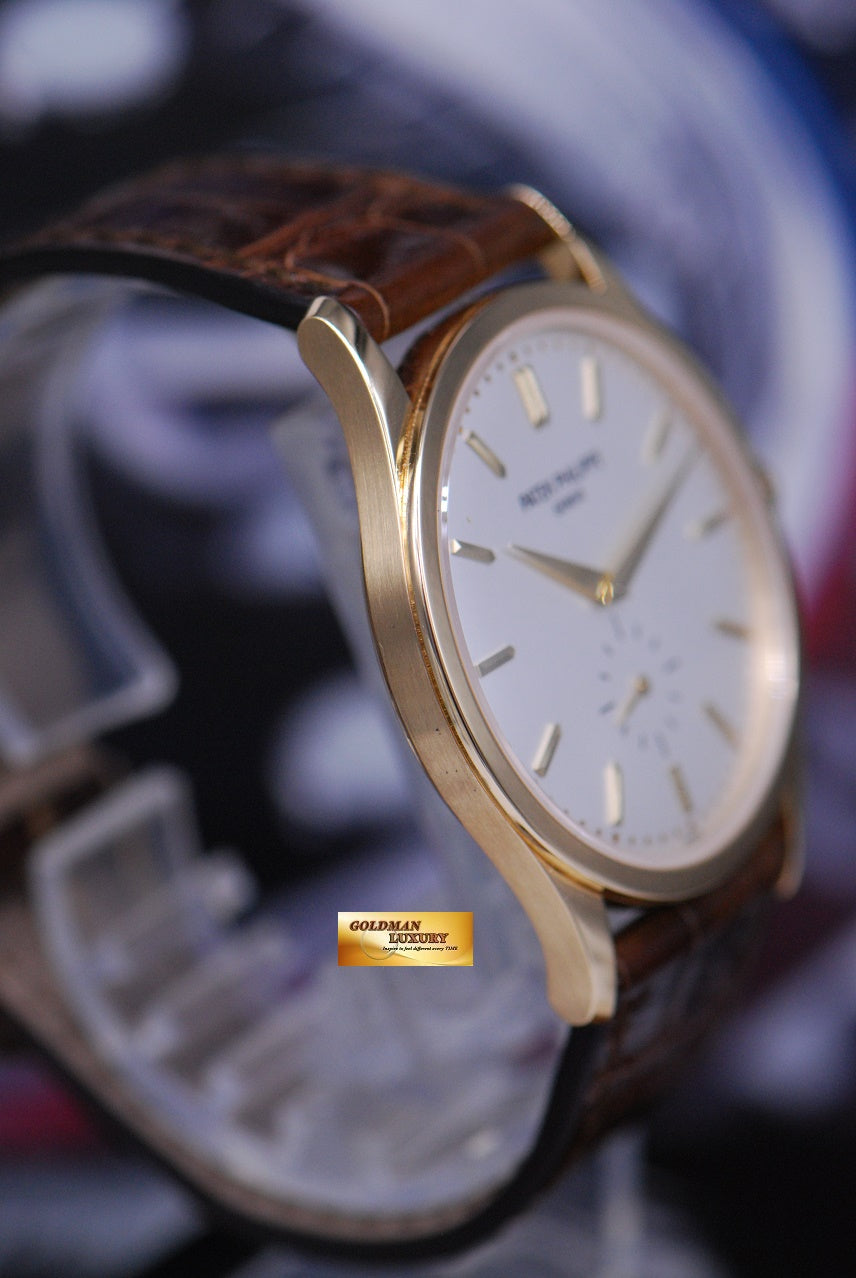 [SOLD] PATEK PHILIPPE CALATRAVA 37mm 18K YELLOW GOLD SUB-SEC DIAL MANUAL 5196J (MINT)