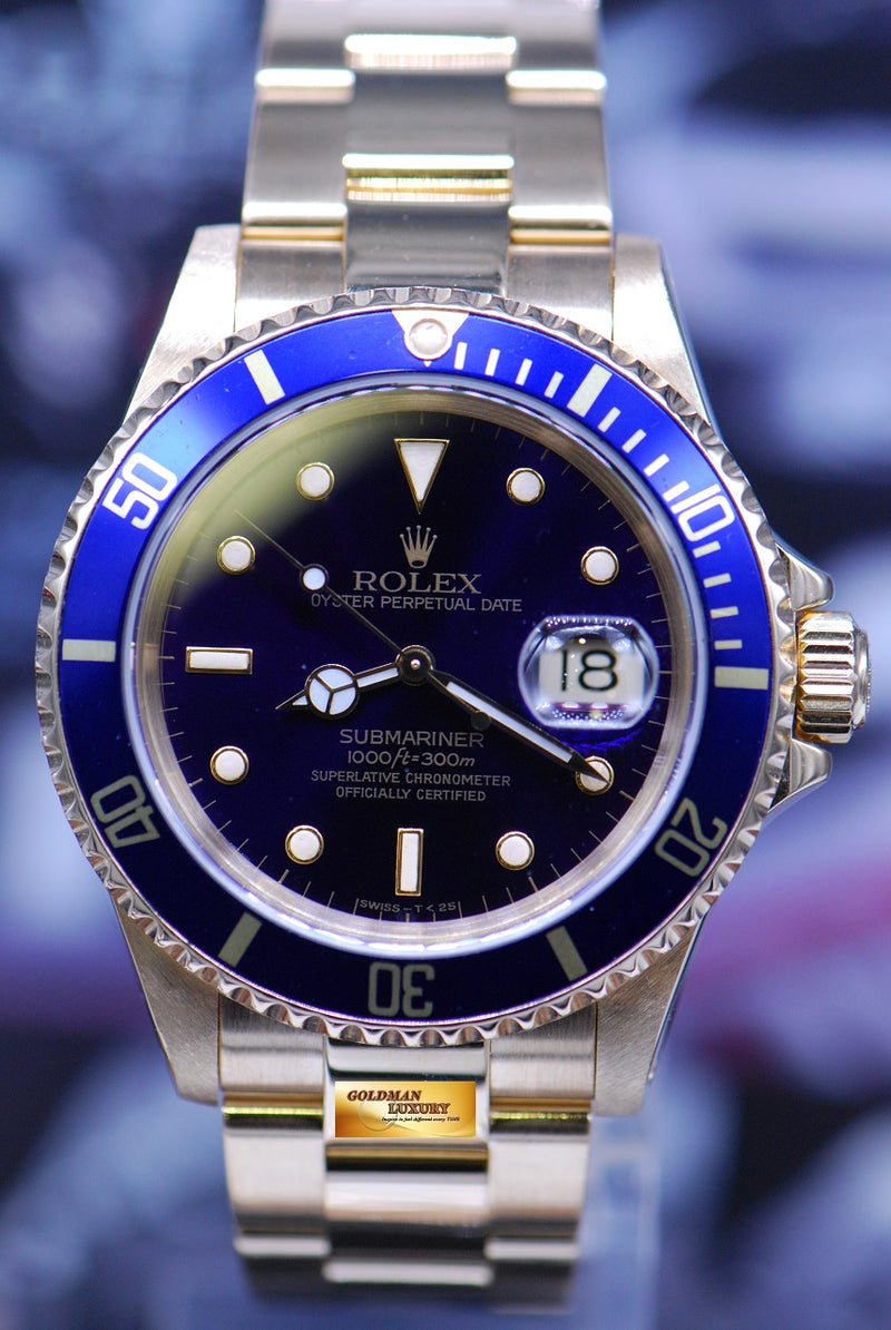products/GML1845_-_Rolex_Oyster_Submariner_18K_Yellow_Gold_Blue_16618_-_1.JPG