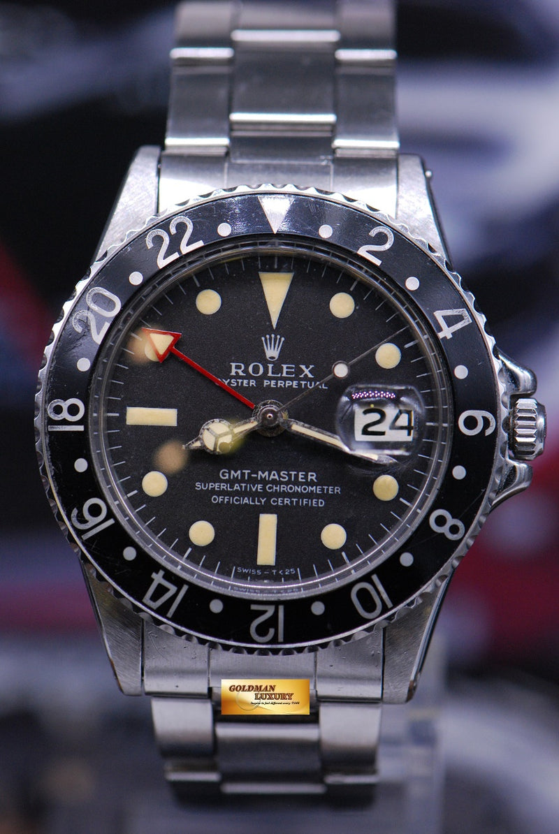 products/GML1848_-_Rolex_Oyster_Vintage_GMT-Master_1675_Mark_1_Red_GMT_Hand_-_1.JPG