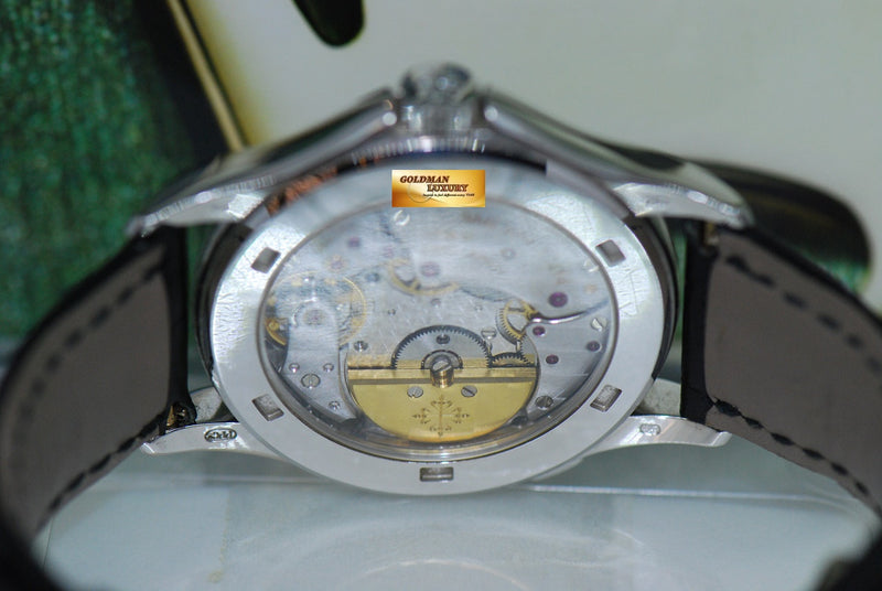 products/GML1974_-_Patek_Philippe_World_Time_18K_White_Gold_Automatic_5110G_-_8.JPG