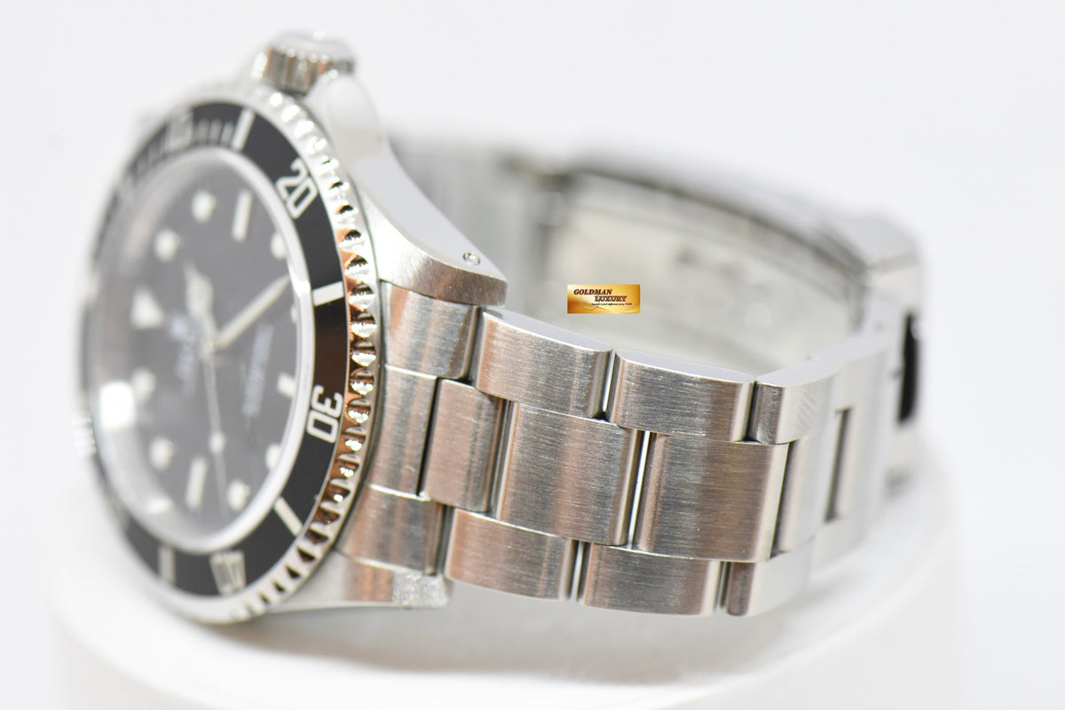 [SOLD] ROLEX OYSTER PERPETUAL SUBMARINER NO-DATE 40mm 2 LINERS BLACK 14060 (MINT)