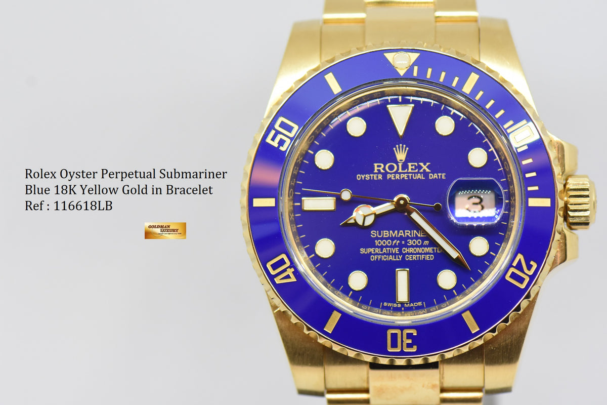 [SOLD] ROLEX OYSTER PERPETUAL SUBMARINER BLUE CERAMIC BEZEL 18K YELLOW GOLD IN BRACELET 116618LB (MINT)