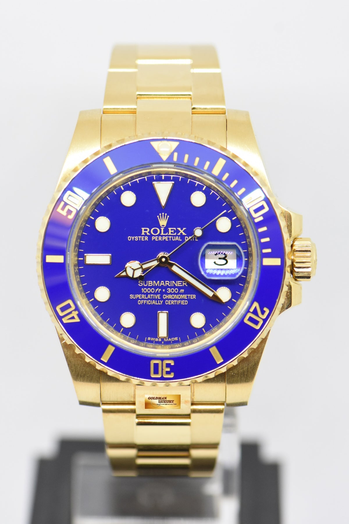 [SOLD] ROLEX OYSTER PERPETUAL SUBMARINER BLUE CERAMIC BEZEL 18K YELLOW GOLD IN BRACELET 116618LB (MINT)