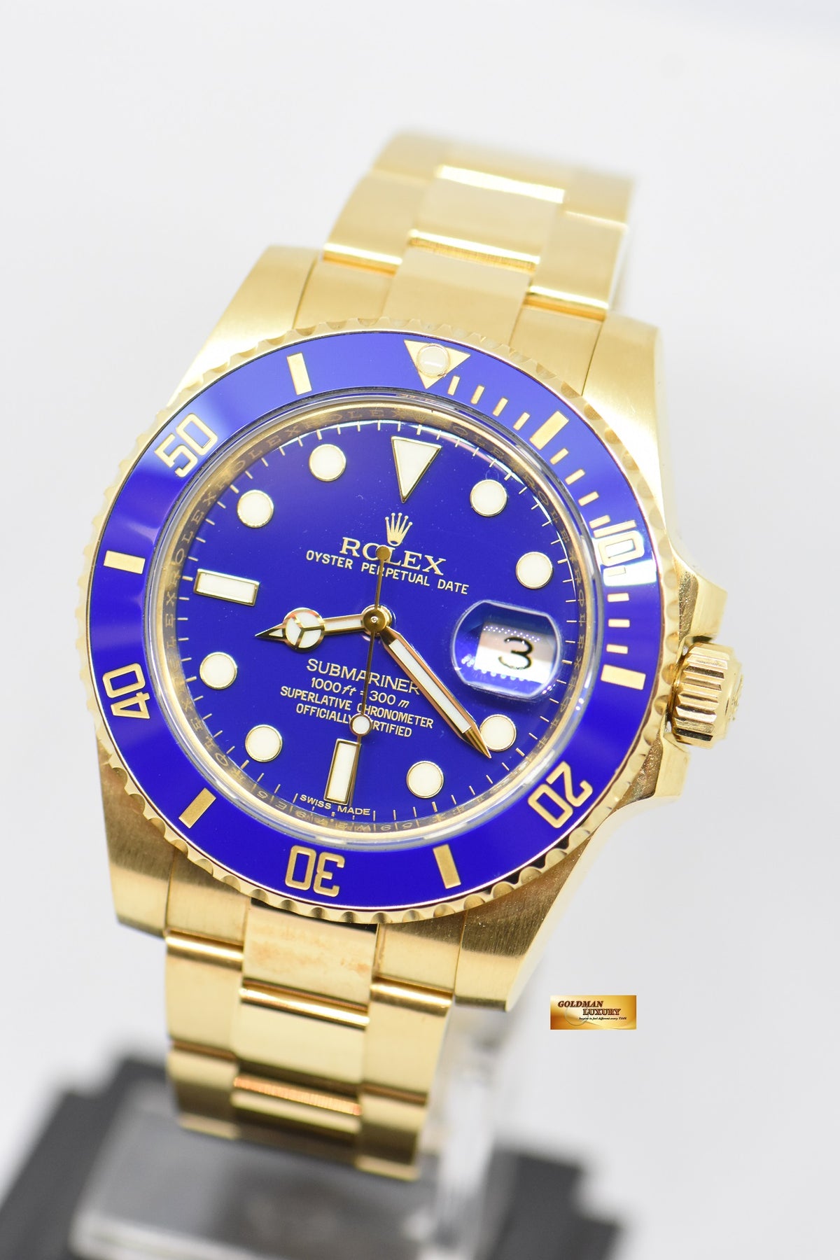 [SOLD] ROLEX OYSTER PERPETUAL SUBMARINER BLUE CERAMIC BEZEL 18K YELLOW GOLD IN BRACELET 116618LB (MINT)