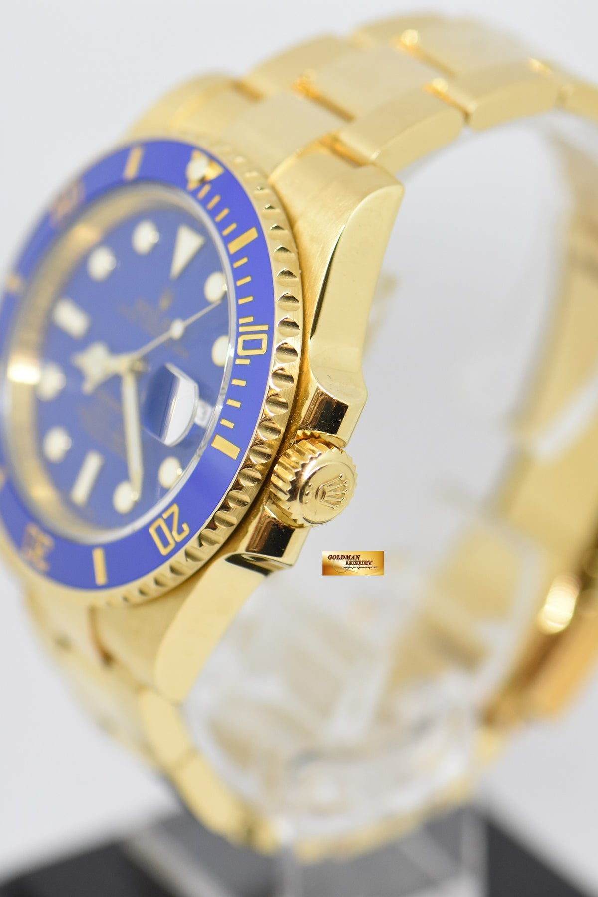 [SOLD] ROLEX OYSTER PERPETUAL SUBMARINER BLUE CERAMIC BEZEL 18K YELLOW GOLD IN BRACELET 116618LB (MINT)