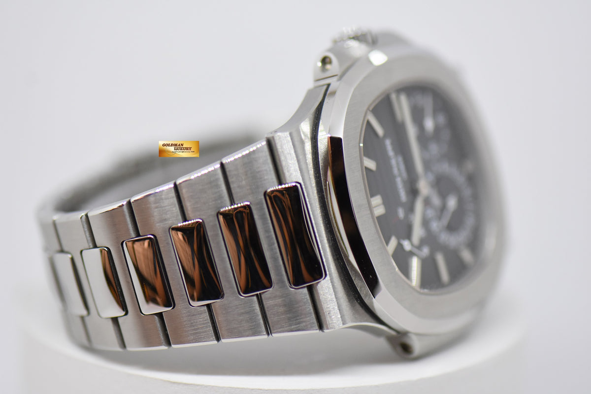 [SOLD] PATEK PHILIPPE NAUTILUS MOONPHASE POWER RESERVE IN STEEL 5712/1A (MINT)