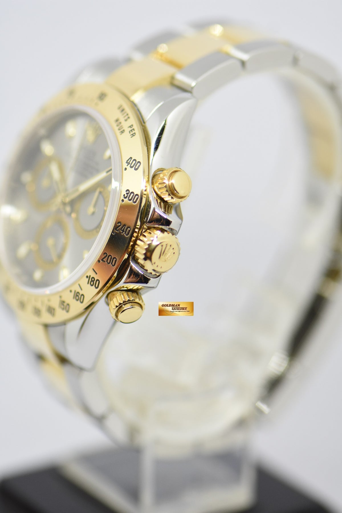 [SOLD] ROLEX OYSTER PERPETUAL DAYTONA HALF-GOLD IN BRACELET SILVER DIAL 116523 (MINT)