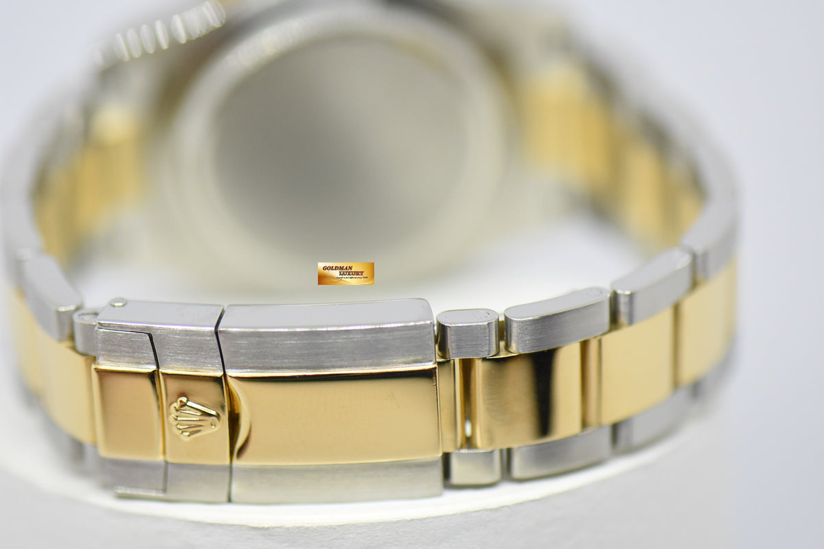 [SOLD] ROLEX OYSTER PERPETUAL DAYTONA HALF-GOLD IN BRACELET SILVER DIAL 116523 (MINT)