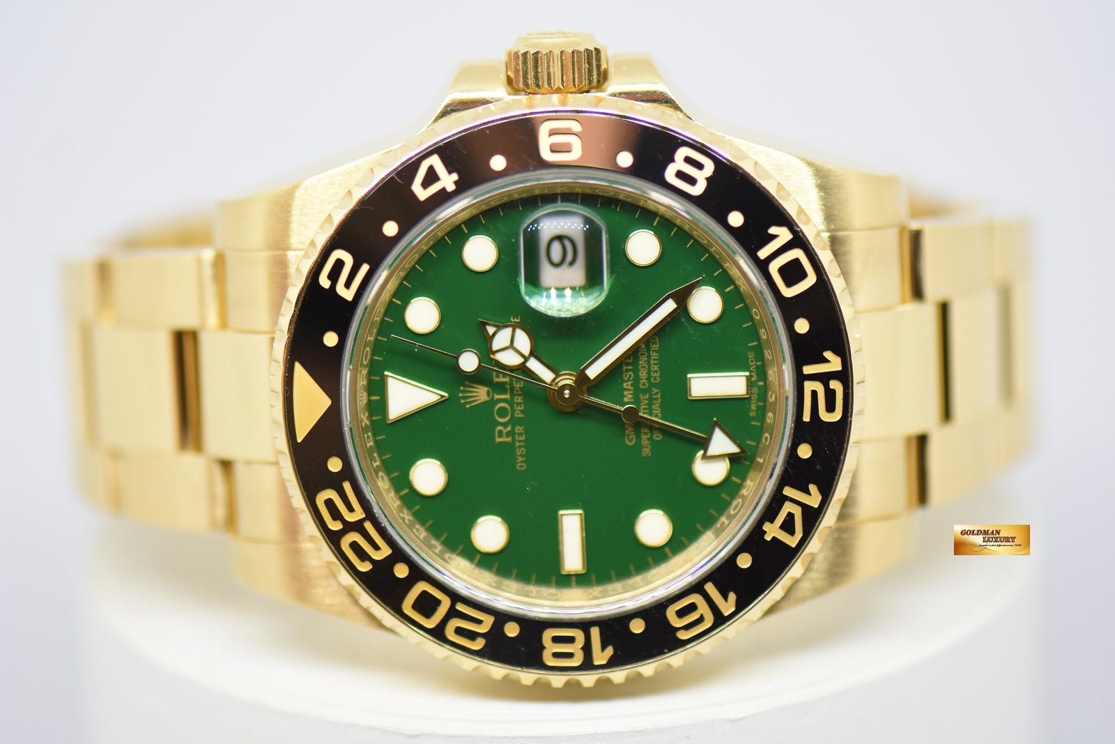 Rolex green dial gold top
