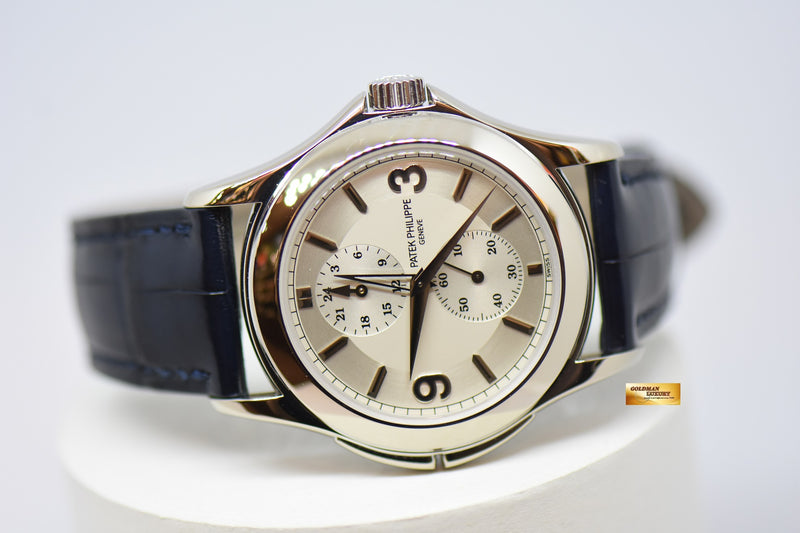 products/GML2343_-_Patek_Philippe_Travel_Time_37mm_White_Gold_Manual_5134G_-_10.jpg
