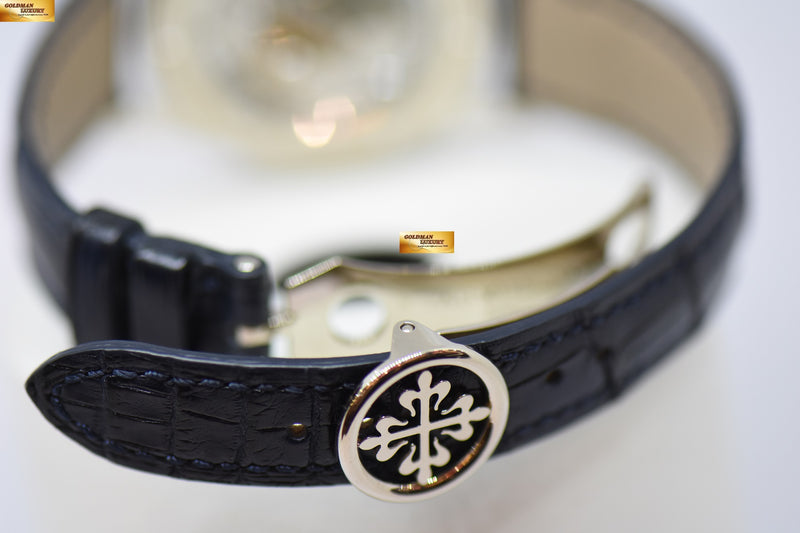 products/GML2343_-_Patek_Philippe_Travel_Time_37mm_White_Gold_Manual_5134G_-_9.jpg