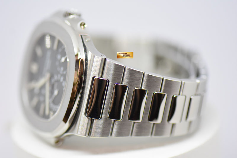 products/GML2345_-_Patek_Philippe_Nautilus_40mm_Moonphase_Power_Reserve_Steel_5712_-_7.jpg